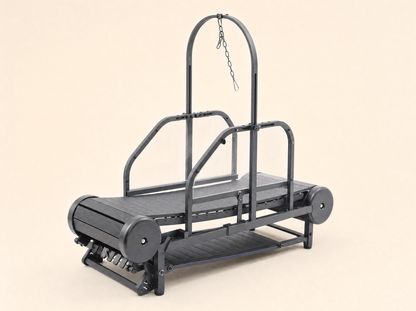 ROV Running Machine, rear three-quarter view showing the incline mechanism and folding hinge