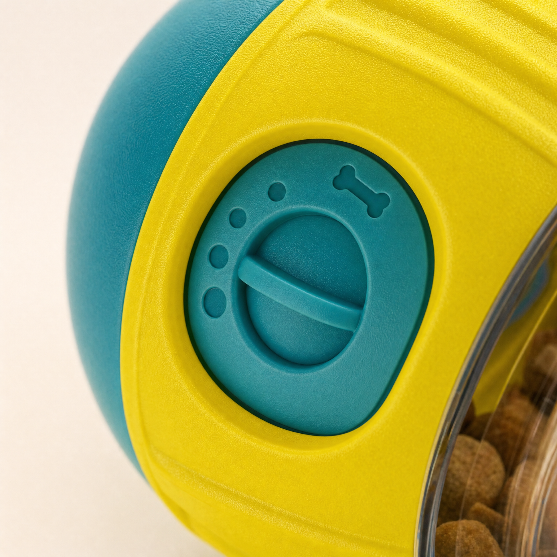 Treat-dispensing toy ball adjustable dial detail