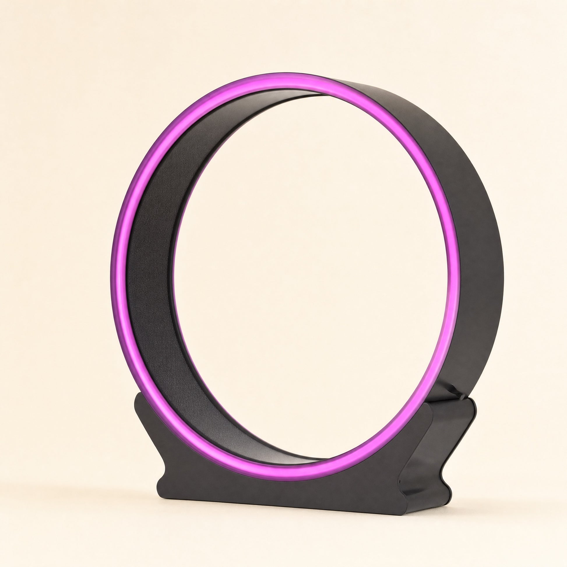 Cat exercise wheel with LED light ring, studio view on warm cream background
