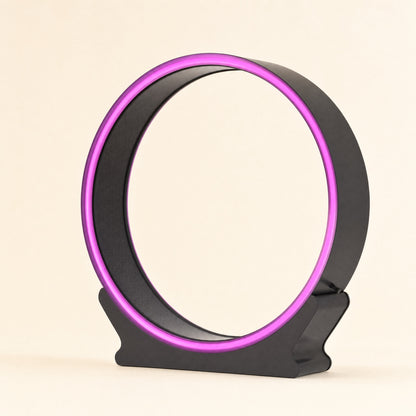 Cat exercise wheel with LED light ring, studio view on warm cream background