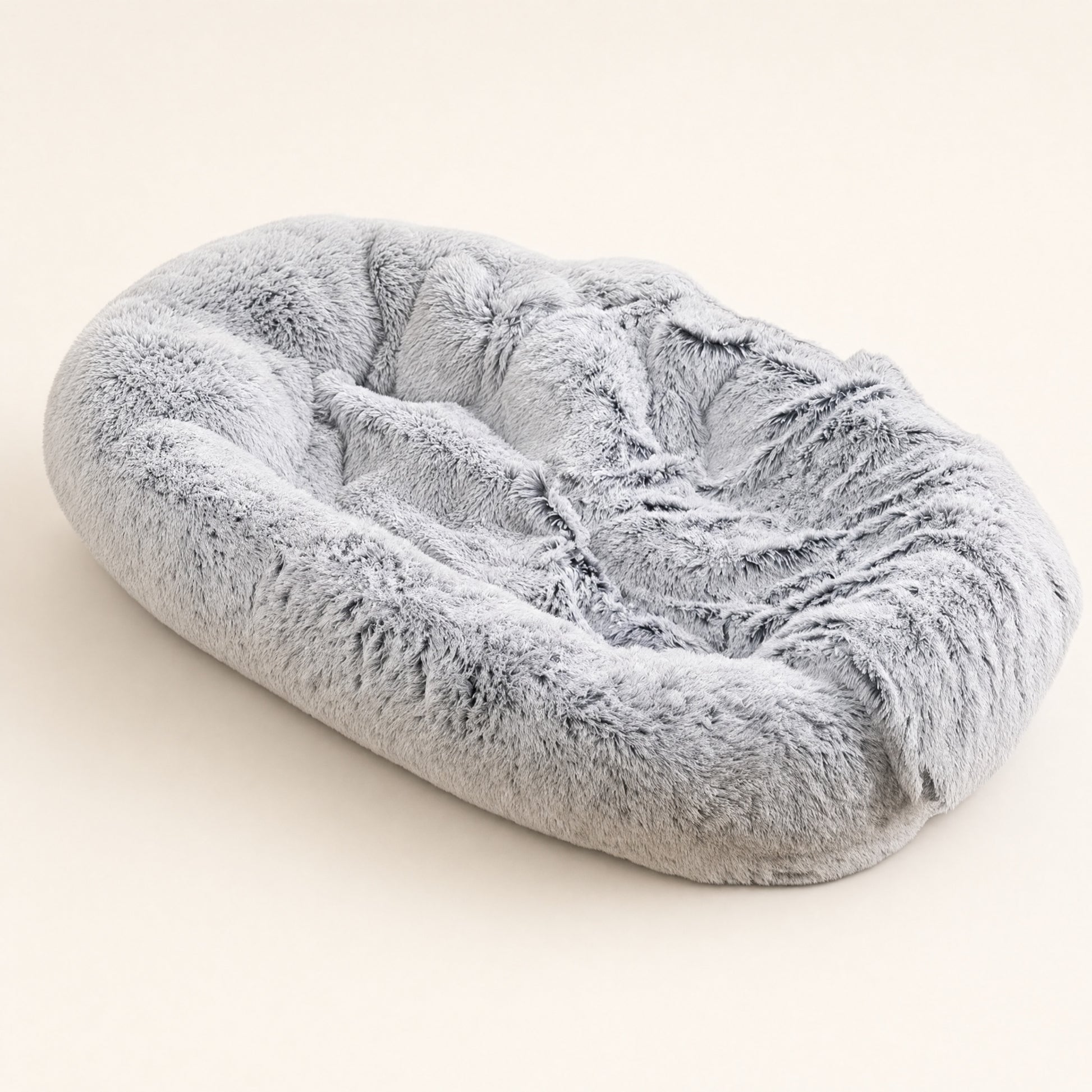 Giant plush grey dog bed, solo product shot